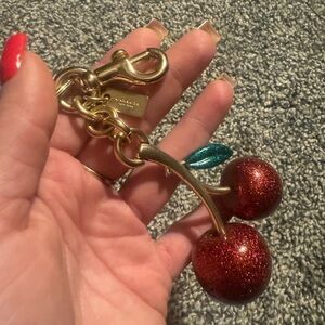 Coach Glitter Cherry Keychain with Gold Hardware